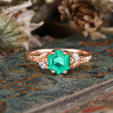 Nature-Inspired 4 - Prong Kite - Cut Natural Emerald Ring